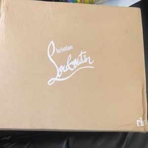 Christian Louboutin red bottom sneakers